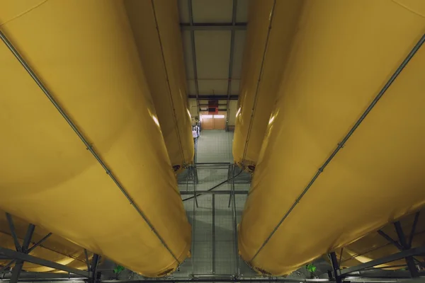 Industrial interior with welded silos