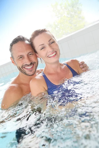 Couple enjoying hot tub bath