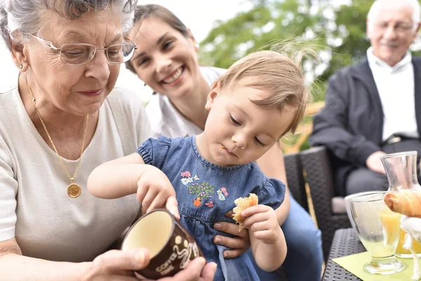 Granddaughter visiting grand-parents