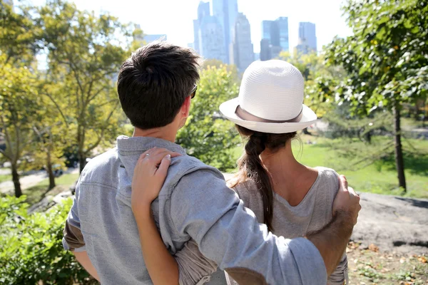 Couple in Central Park enjoying skyline