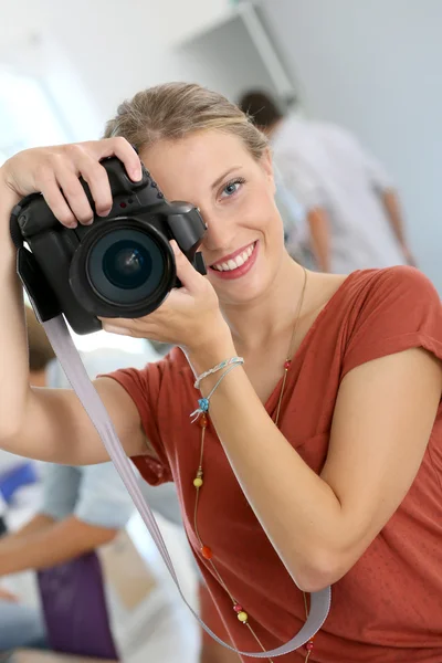 Woman in photography training class