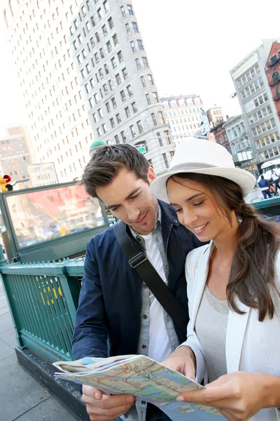 Couple looking at city map