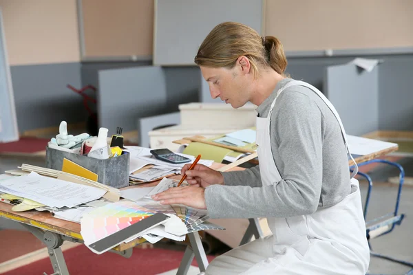 Painter preparing colour sample