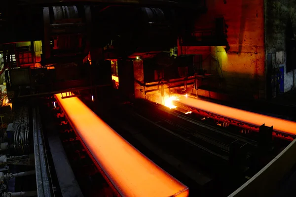 Gas cutting of the hot metal in a plant