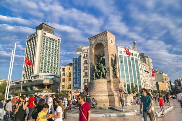 Turkish people gathering and waving flags at Taksim Square. The meetings were called Duty for Democracy after the failed July-15 coup attempt of Gulenist militants.