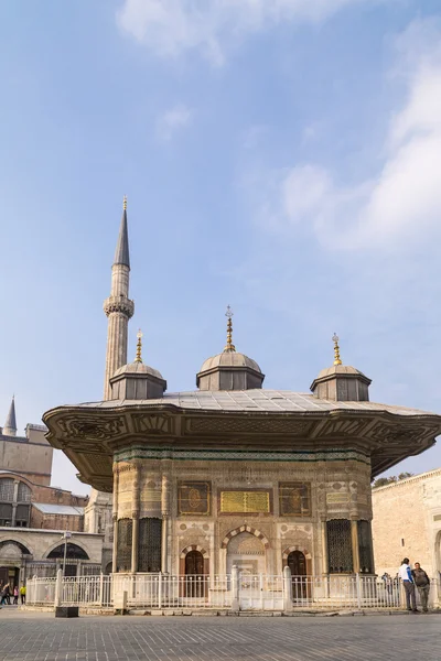 The fountain of Sultan Ahmed III next to the Hagia Sophia Museum, a significant landmark of Istanbul in Sultanahmet Square, Fatih, Istanbul, Turkey.