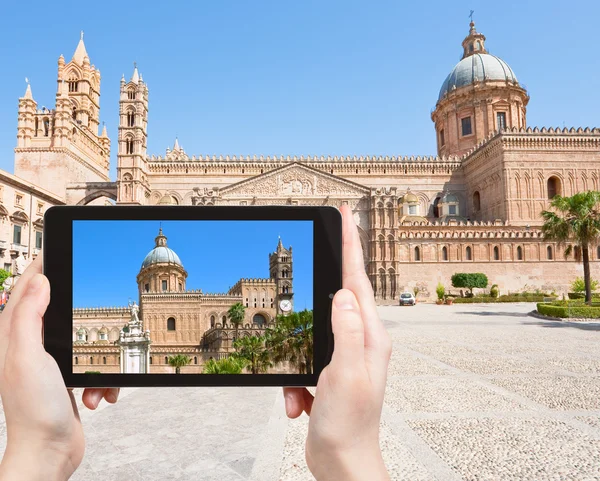Tourist taking photo of Cathedral of Palermo