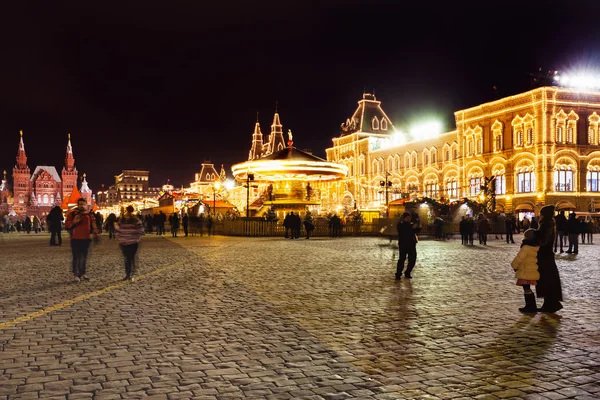 Tourists on Red Square in Moscow in night