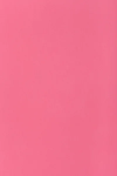 Dark pink colored vertical sheet of paper