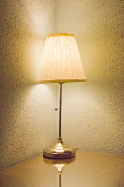 Included lamp on a table