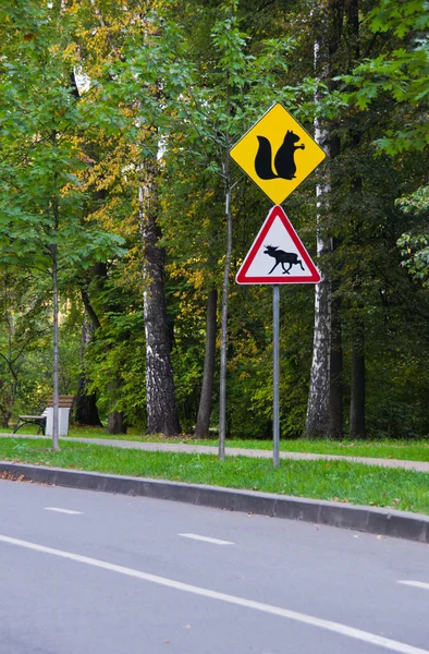 Road signs of animals near the path