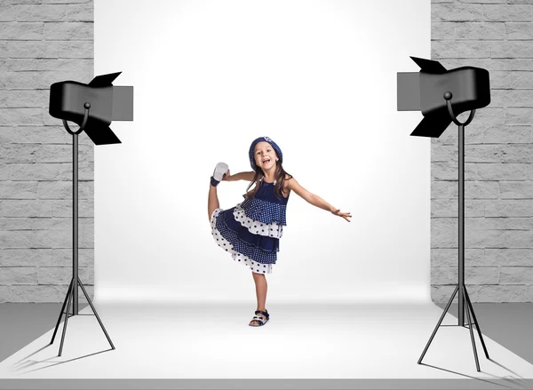 Little girl in photo studio