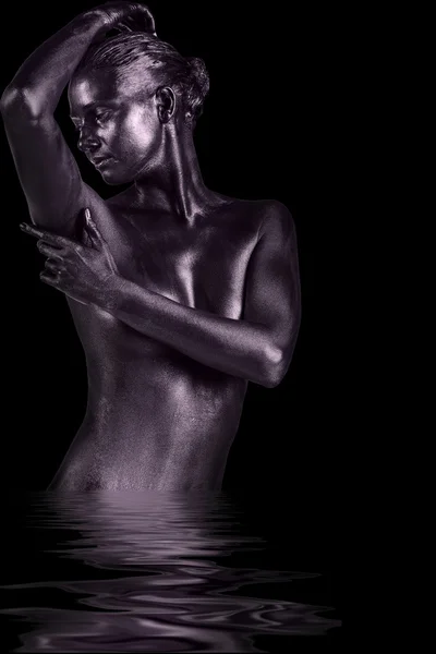 Sexy woman with black glossy skin