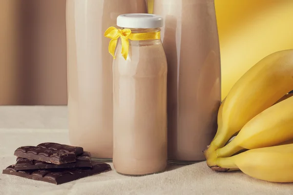 Chocolate banana flavored yogurt on the table. Healthy Lifestyle