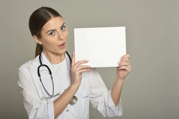 Female doctor with white list
