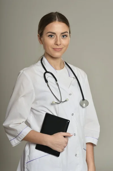 Female doctor with tablet pc