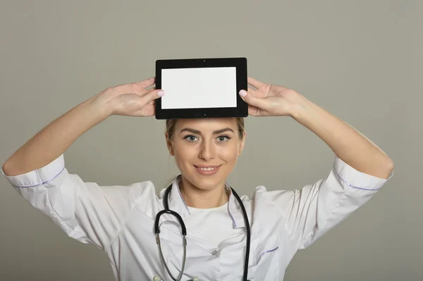 Female doctor with tablet pc