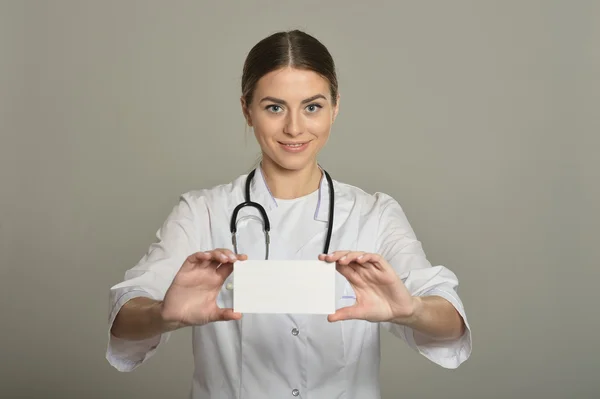 Female doctor with white list
