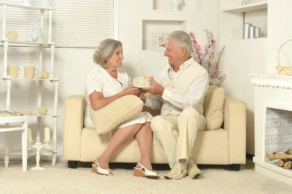 Elderly people sitting at home
