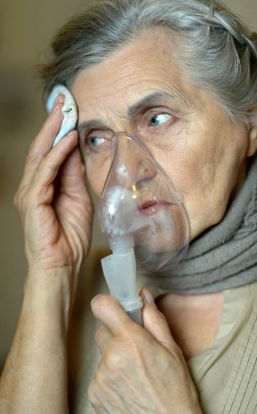 Woman with flu inhalation
