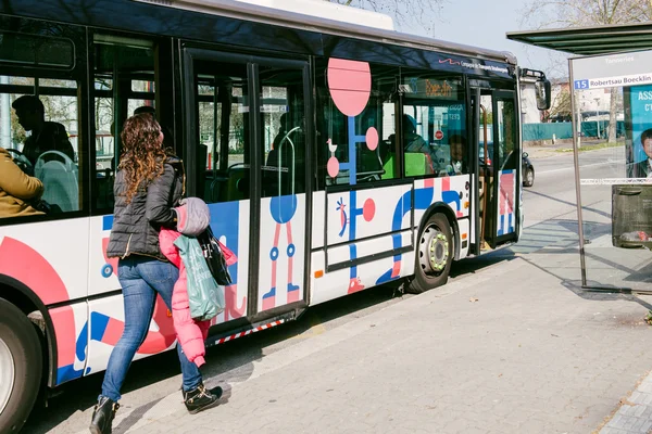 Woman running to catch the bus