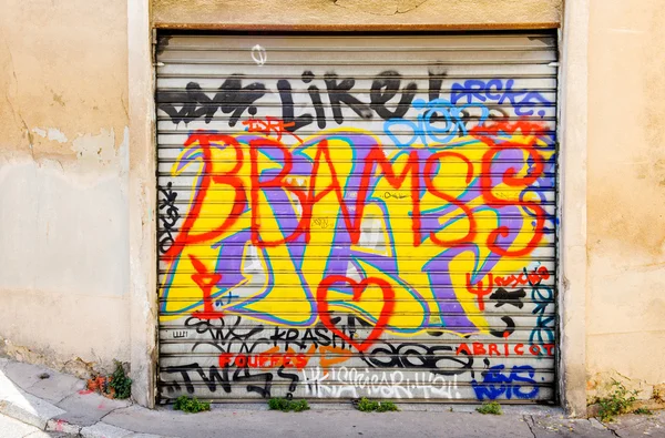 Old graffiti on a garage door