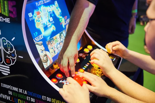 An playing arcade game