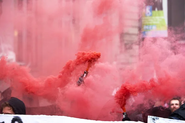 Smoke grnades and paint on walls at protest