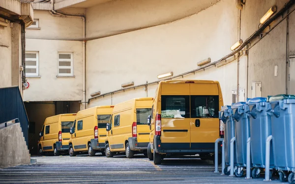 Yellow delivery vans trucks distribution