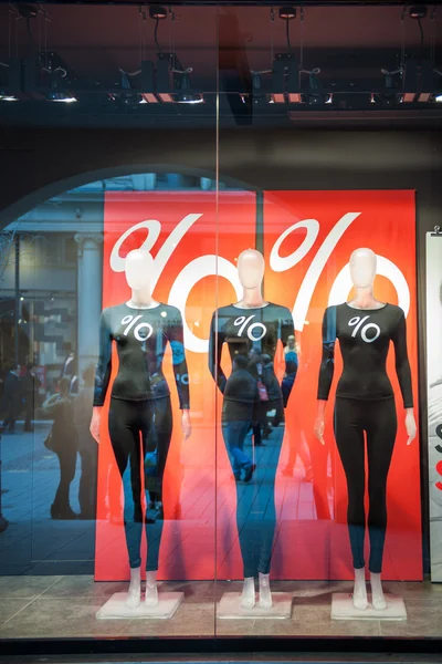 Mannequins wearing percentage discount t-shirts fall sale