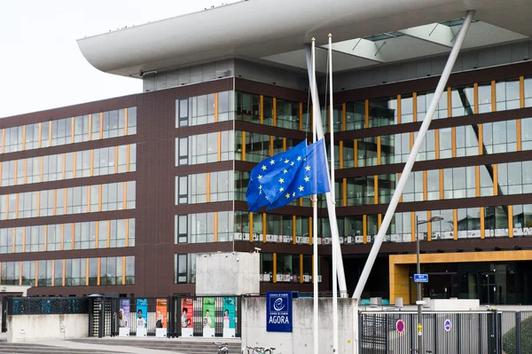 European Union Flag flies at half-mas Agora building