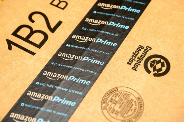 Amazon Prime logotype printed on cardboard box security scotch t