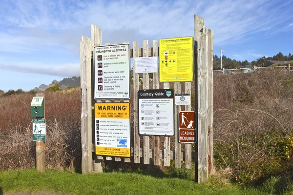 Signposts and warnings Oregon coast.