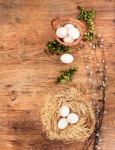 Easter composition of eggs, catkins and boxtree