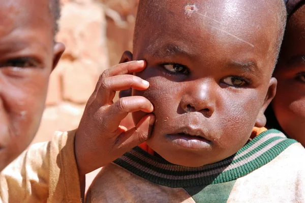 African children in Tanzania while you cleanse your face