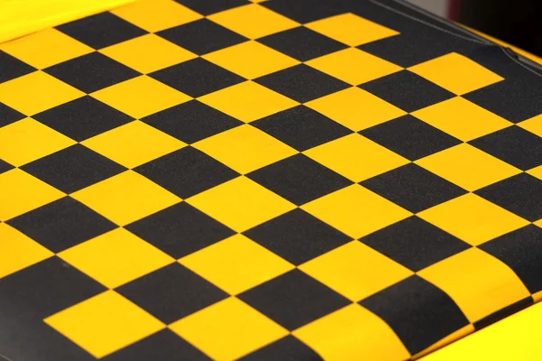 Yellow and Black Checkered Background