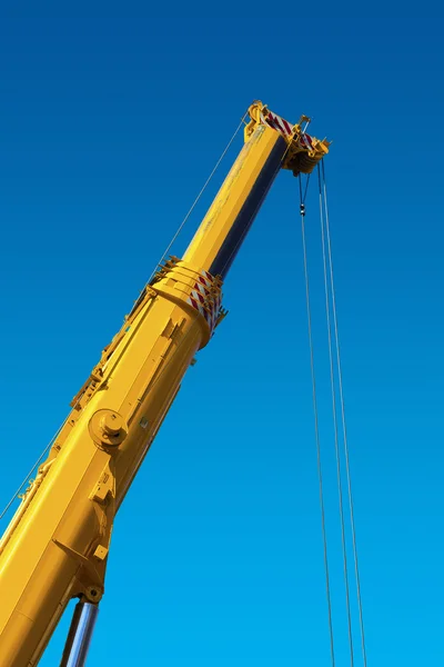 Heavy Hydraulic Crane on Blue Sky