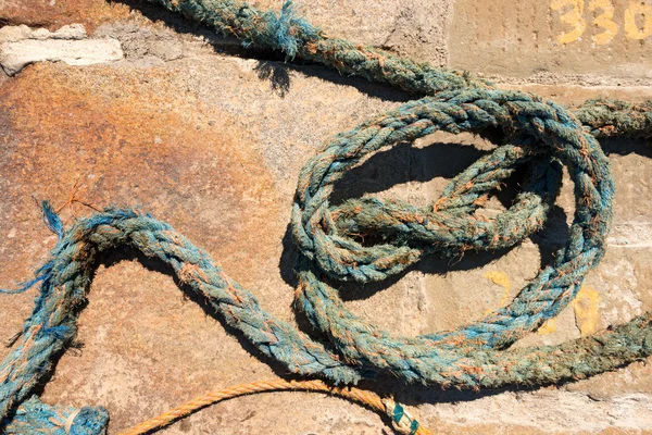 Weathered Nautical Rope on a Pier