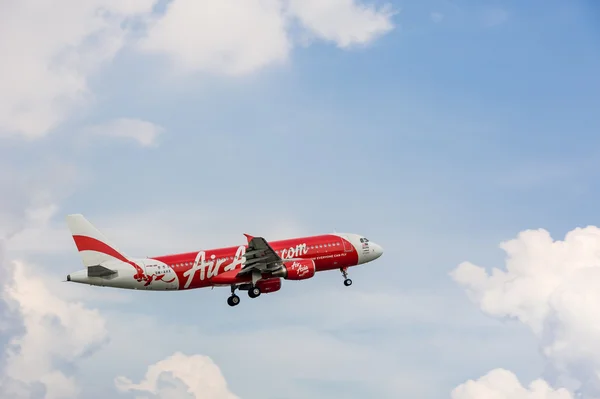Air Asia plane flying in sky