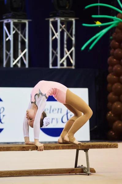 Children compete in international competitions on sport gymnastics 