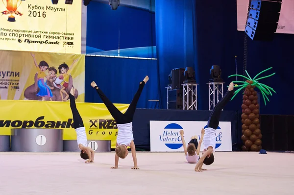 Children compete in international competitions on sport gymnastics 