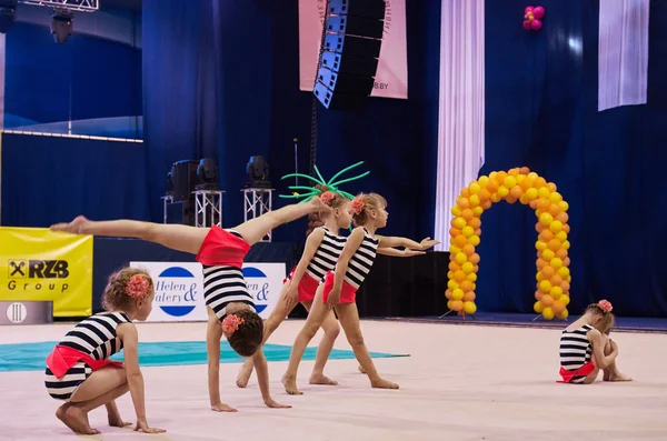 Children compete in international competitions on sport gymnastics \