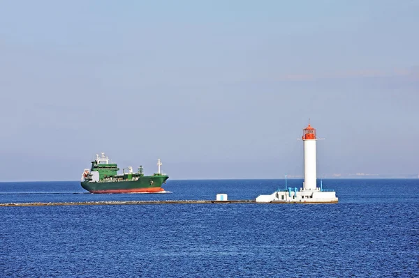 LPG (liquid petroleum gas) tanker and lighthouse