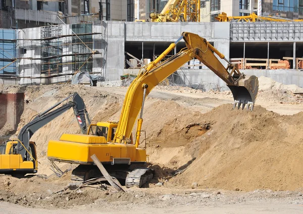 Excavating machine on construction site