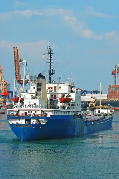 General cargo ship and port crane