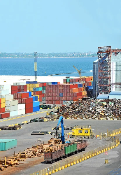 Container, lumber and train in port