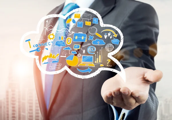 Businessman showing cloud with business sketches