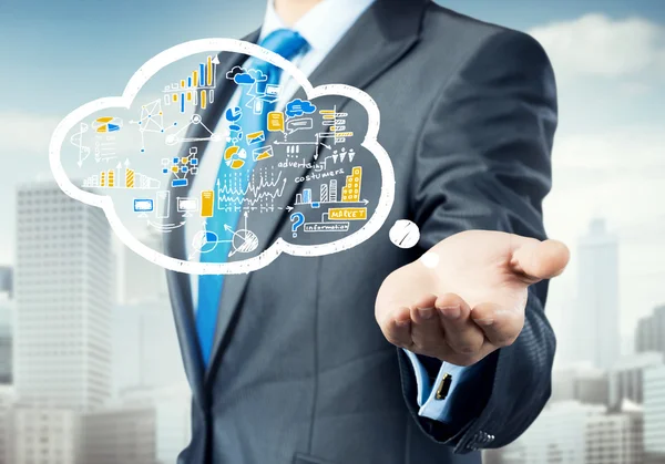 Businessman showing cloud with business sketches