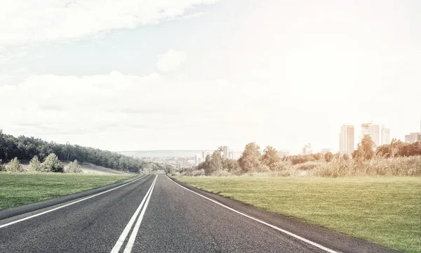 Asphalt road to horizon