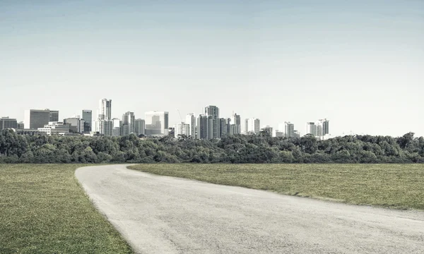 Asphalt road and modern city